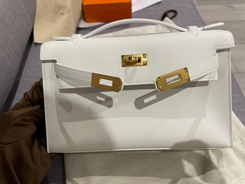 Hermes Kelly Pochette White Swift Gold Hardware 124098
