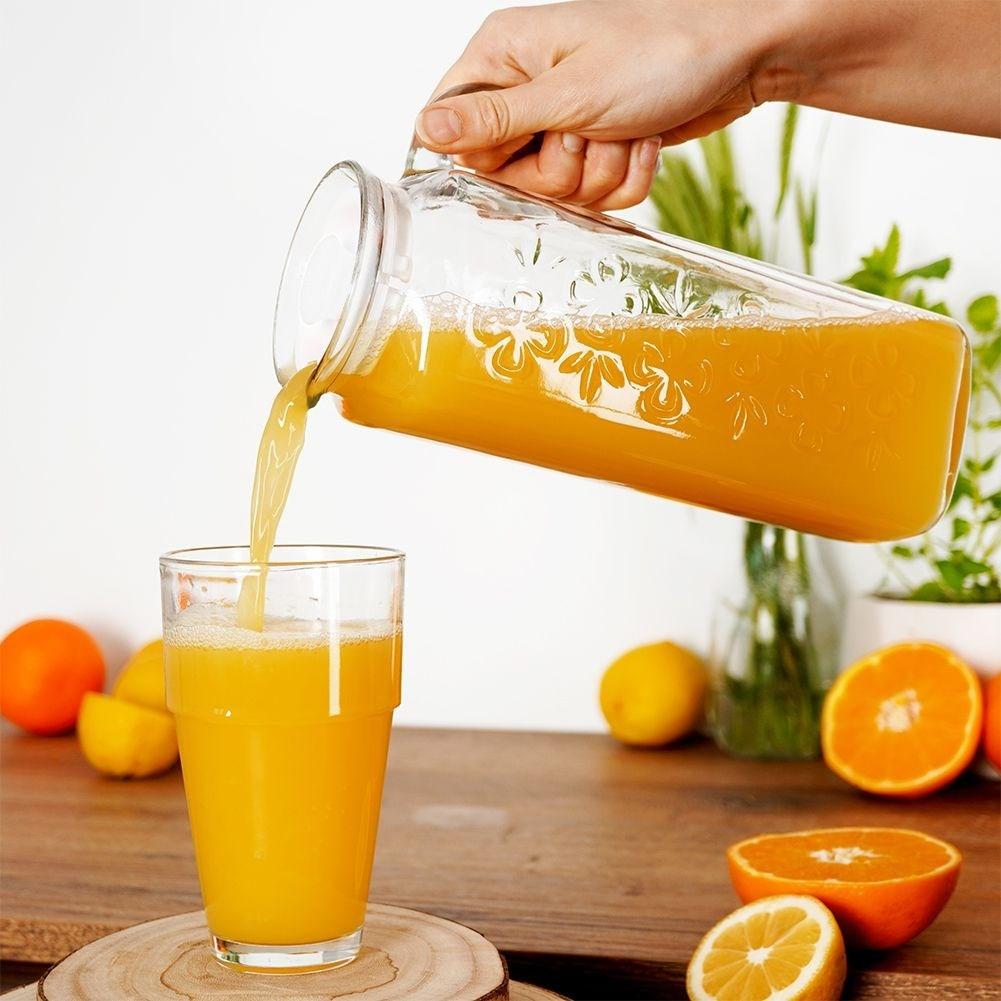 Orion Vielseitiger Glaskrug mit Kunststoffdeckel für Getränke