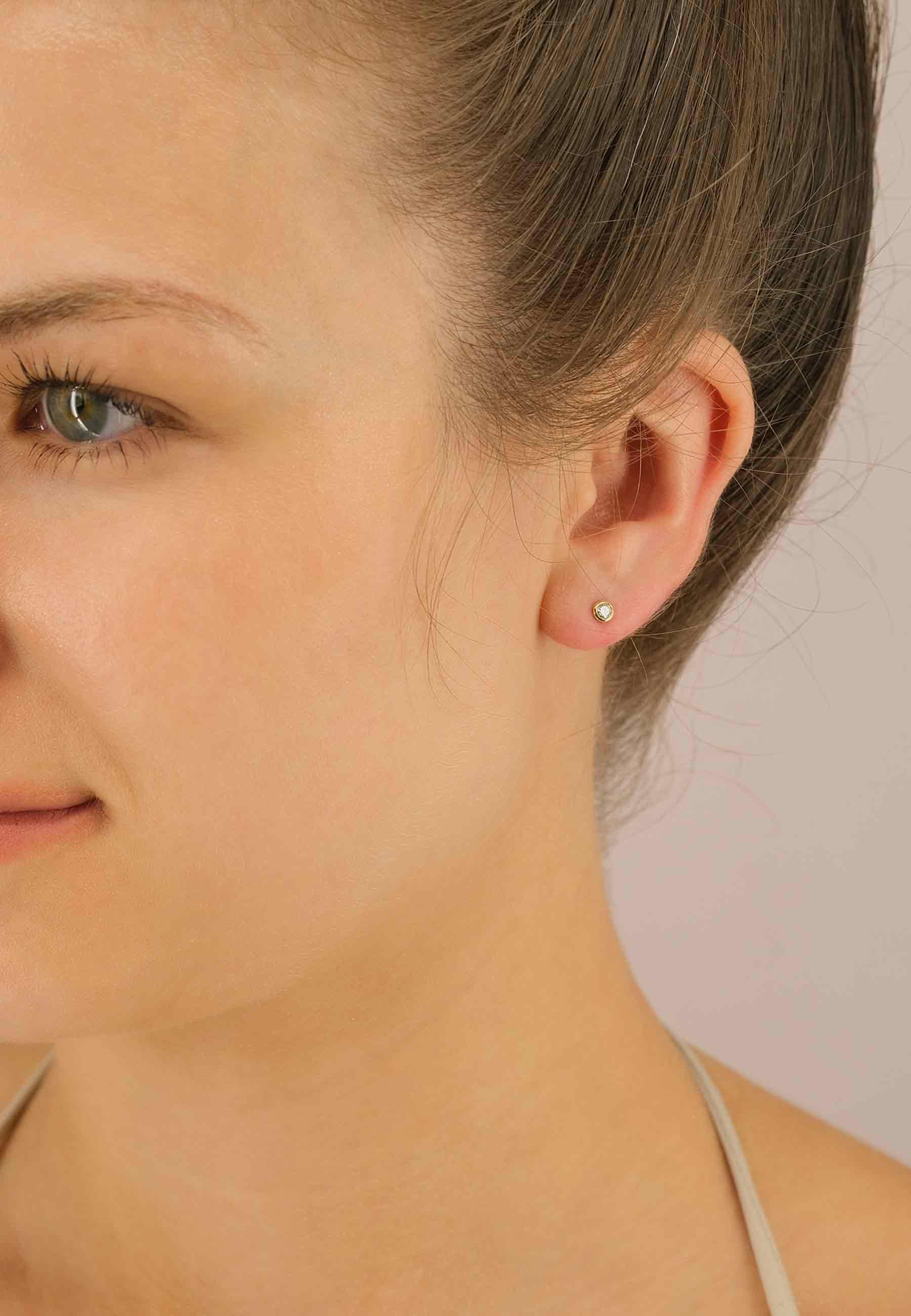 MUAU Schmuck Solitär Ohrstecker Zargen-Fassung Gelbgold 750 Brillanten 0.15ct. 5mm