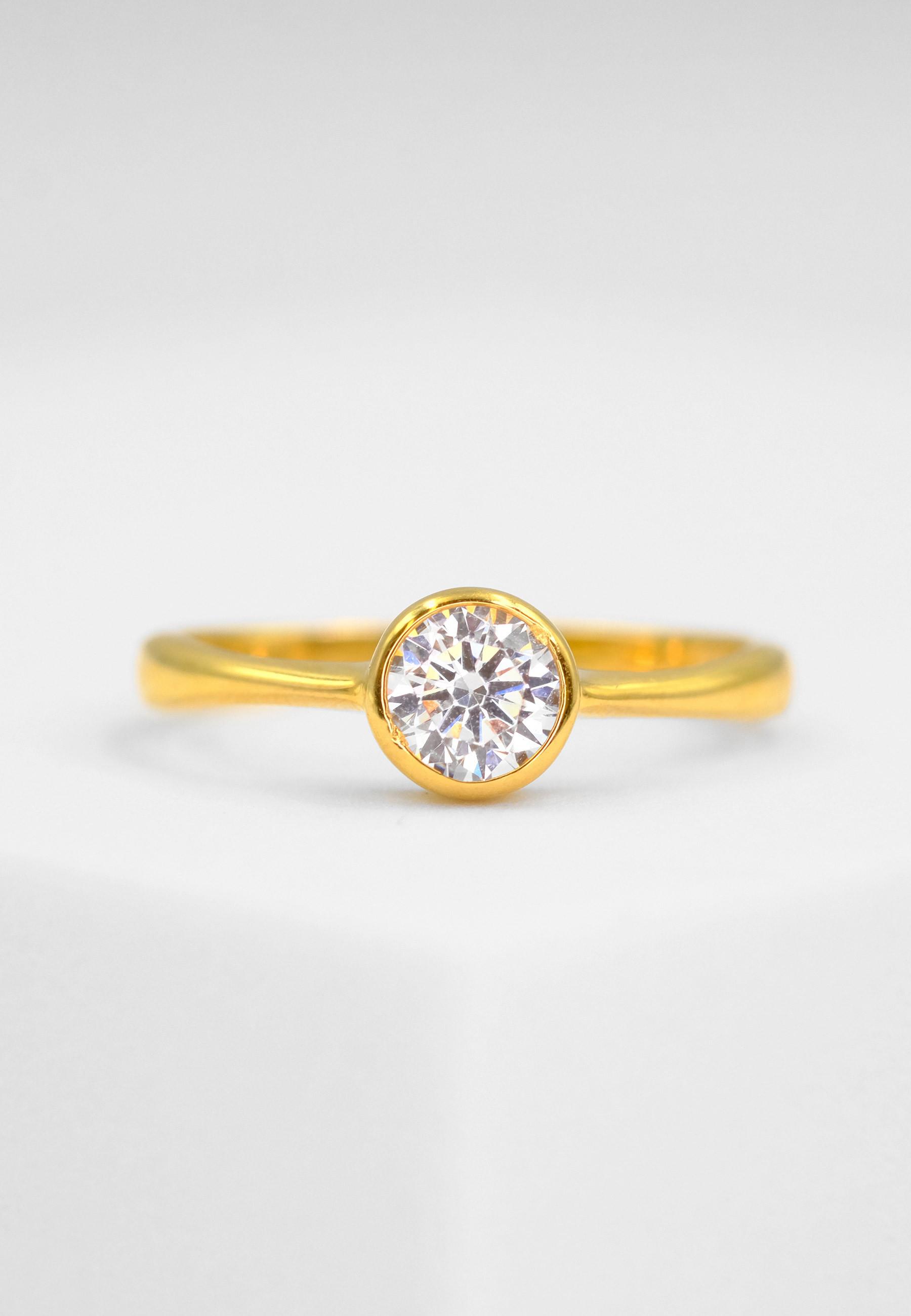 MUAU Schmuck Ring Gelbgold 750 Zirkonia
