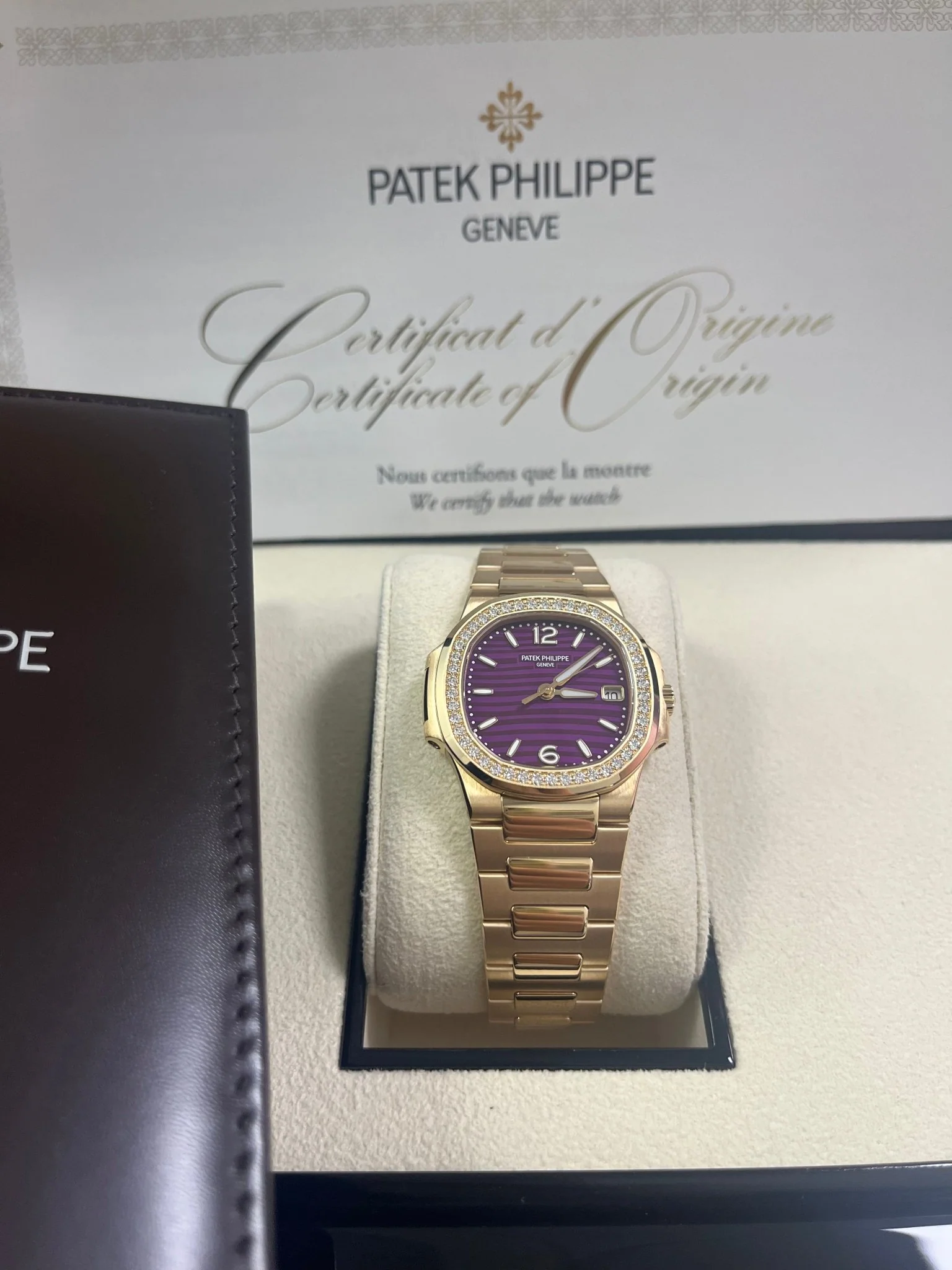Patek Philippe Nautilus 32mm Diamond Bezel Rose Gold Purple Wave Dial 7010/1R-013