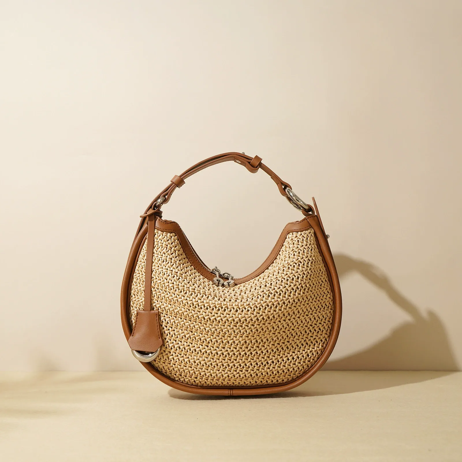 Woven Straw Half-Moon Bag with Leather Trim
