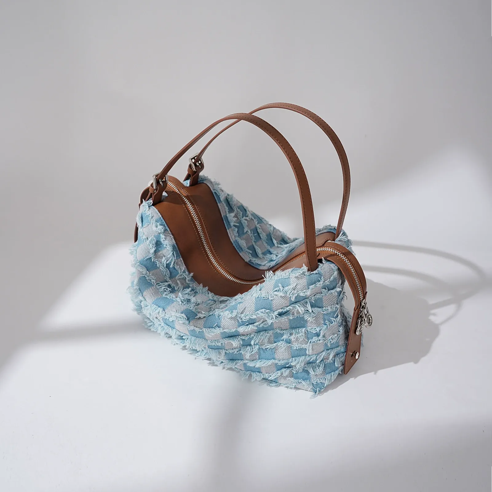 Frayed Denim Shoulder Bag with Curved Silhouette
