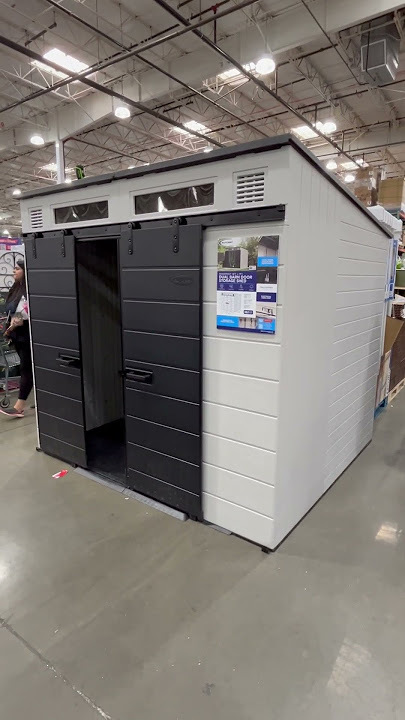 Suncast Modernist 10 ft. 9.5 in. W x 7 ft. 3.5 in. D Barn Door Resin Storage Shed