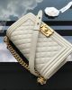 CHANEL CAVIAR QUILTED MEDIUM BOY FLAP IVORY