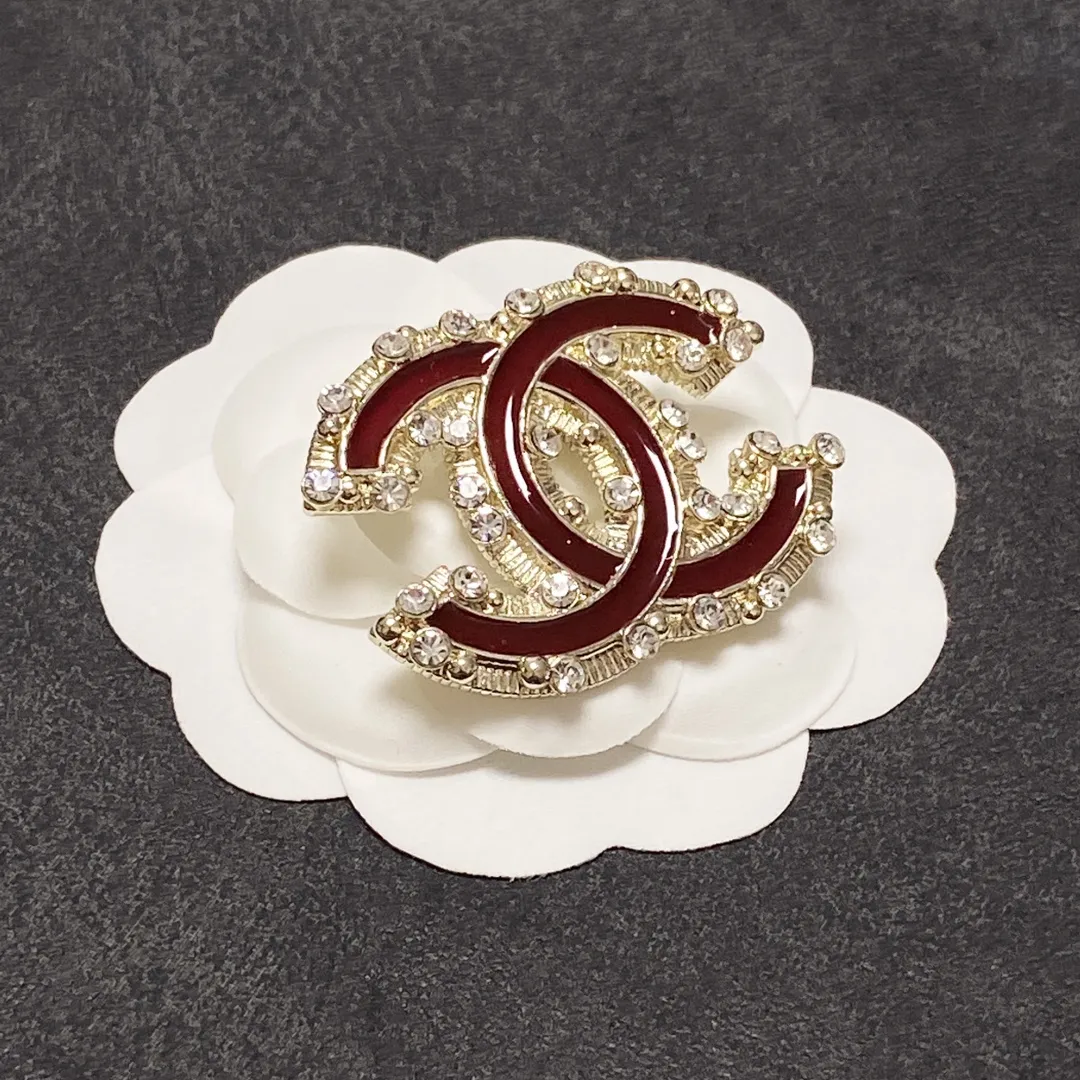 cc Brooch