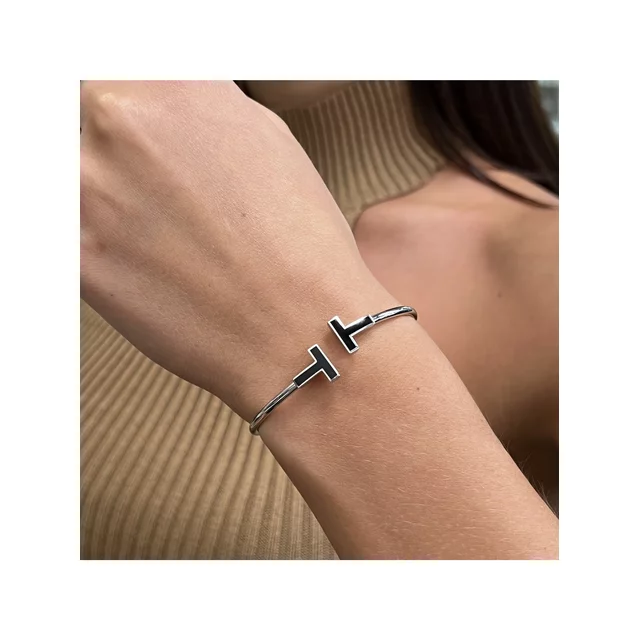 Tiffany & Co. T Black Onyx Wire Bracelet Stainless steel and gold plating White Gold