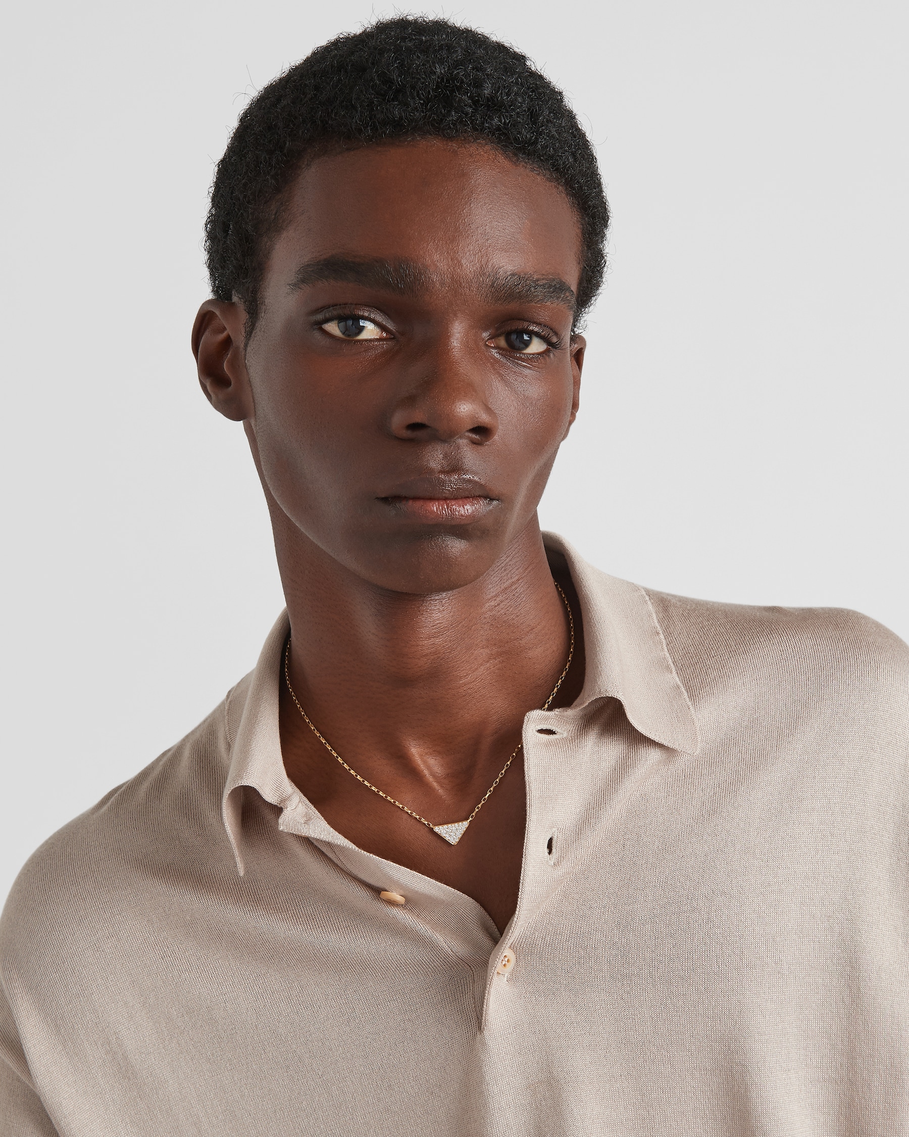 Prada Eternal Gold Eternal mini triangle pendant necklace in yellow gold and diamonds