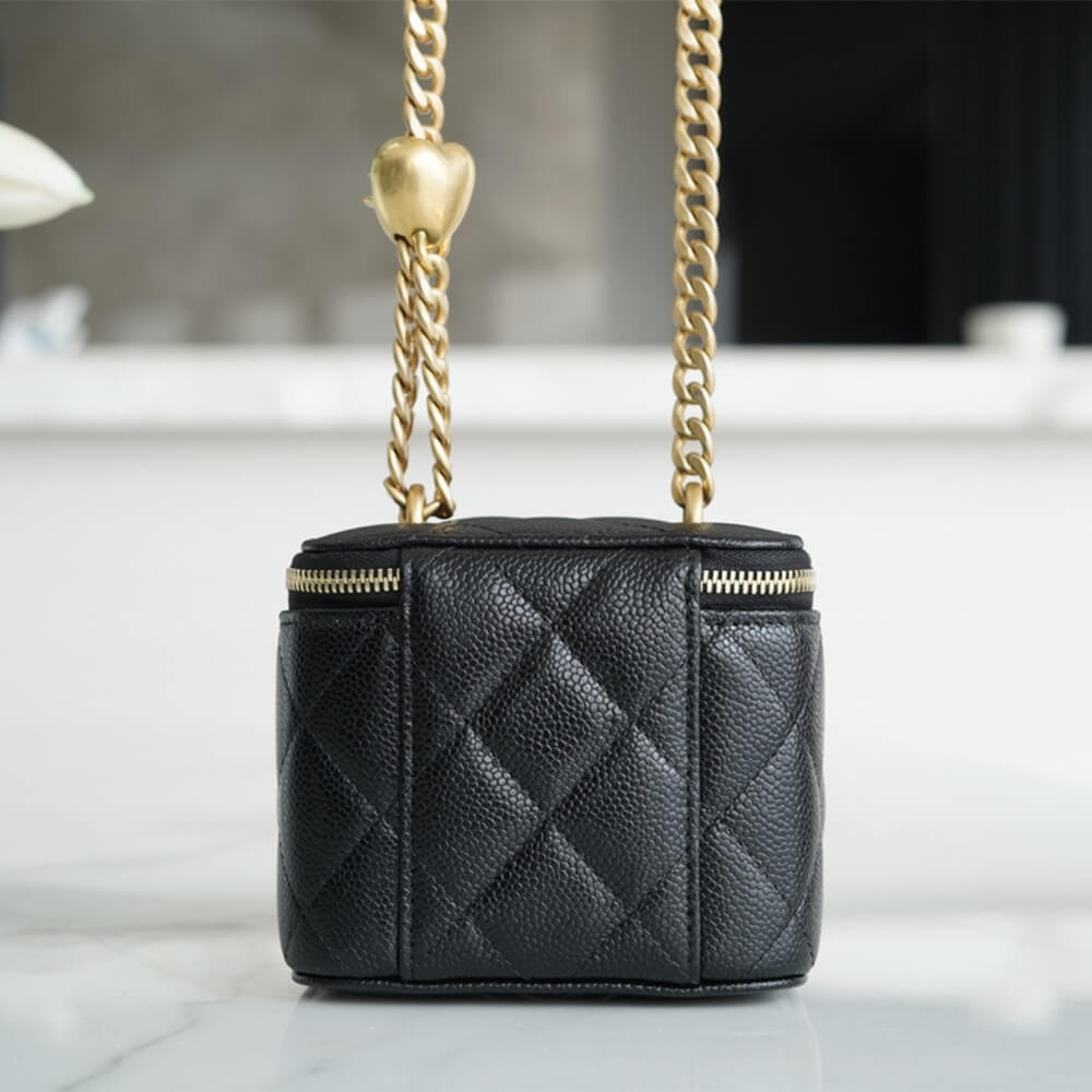 Chanel Small Gold Ball Makeup Bag