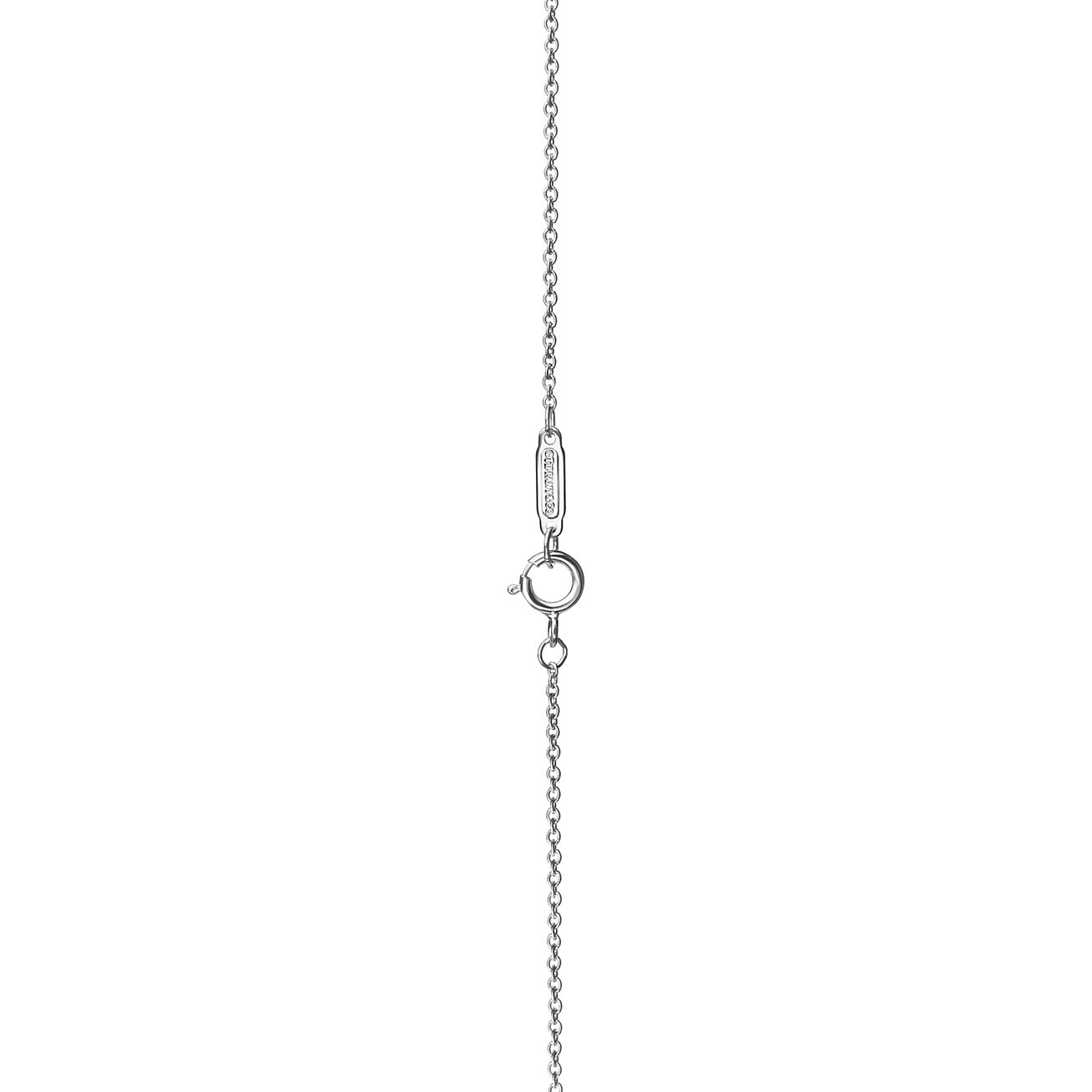 Tiffany & Co. Cross pendant in platinum with diamonds, small.