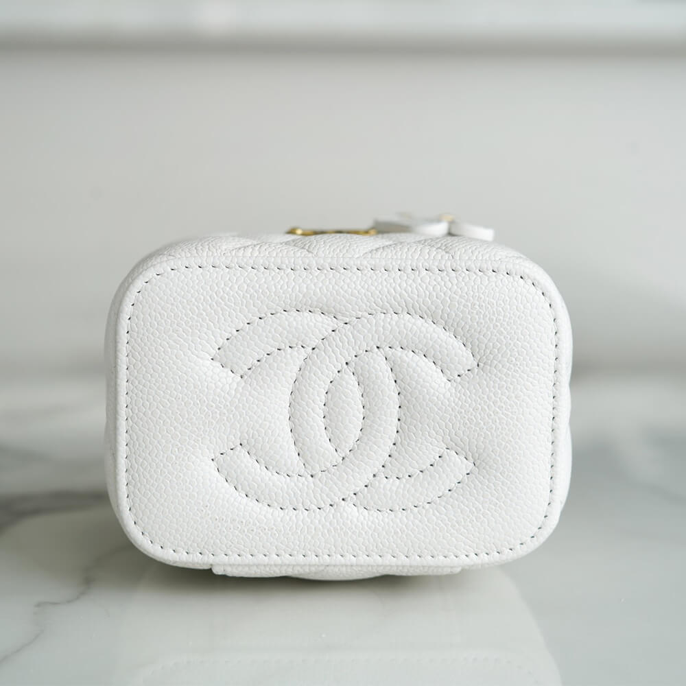 Chanel Small Gold Ball Makeup Bag