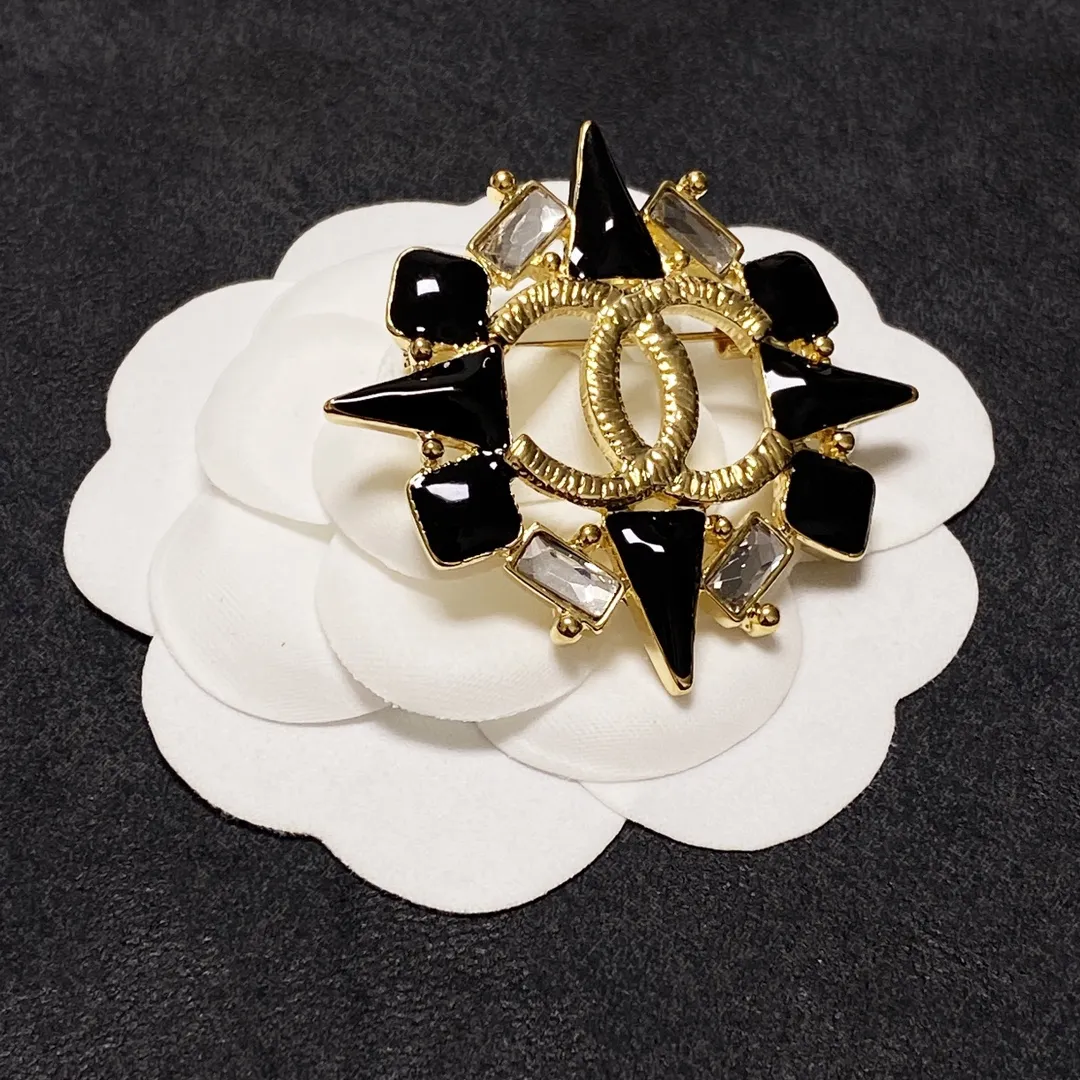 cc Brooch