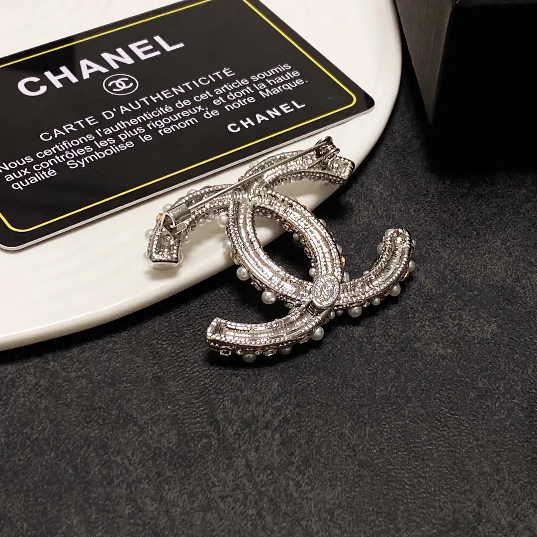 cc Brooch