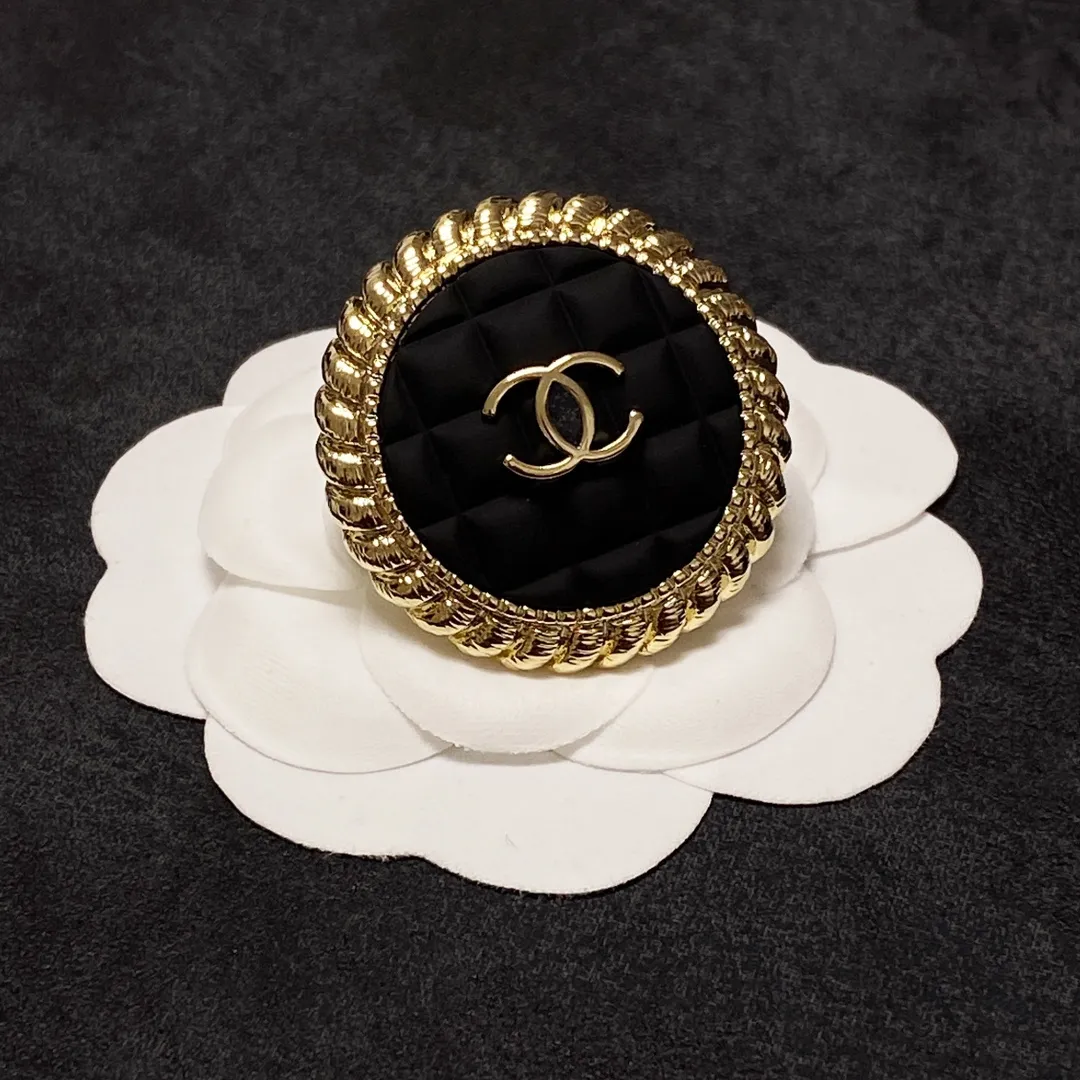 cc Brooch