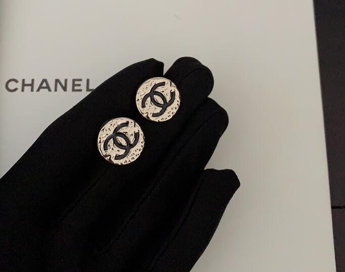Round black double C earrings