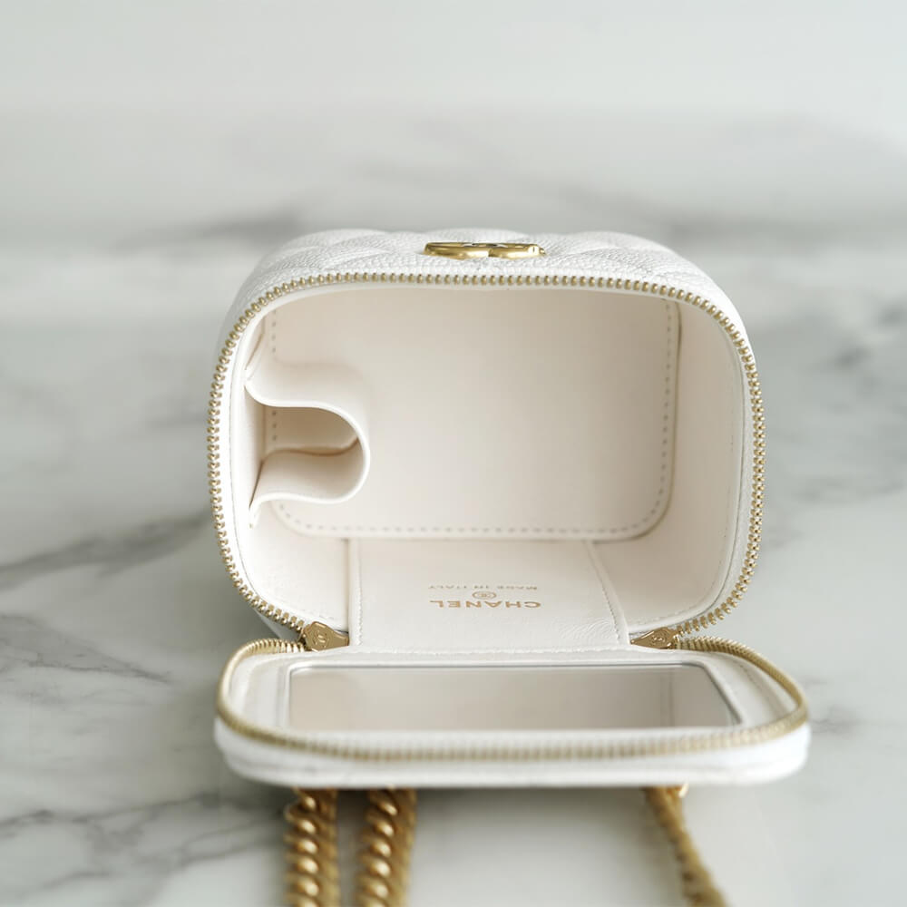 Chanel Small Gold Ball Makeup Bag