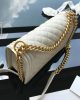 CHANEL CAVIAR QUILTED MEDIUM BOY FLAP IVORY