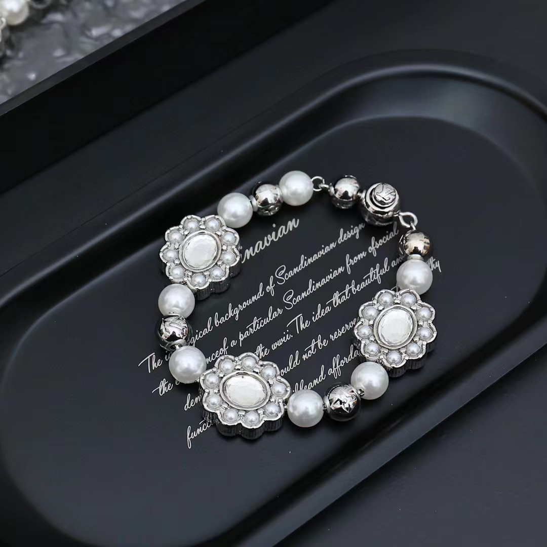 Louis Vuitton Silver Flower Brass Glass Bead Bracelet