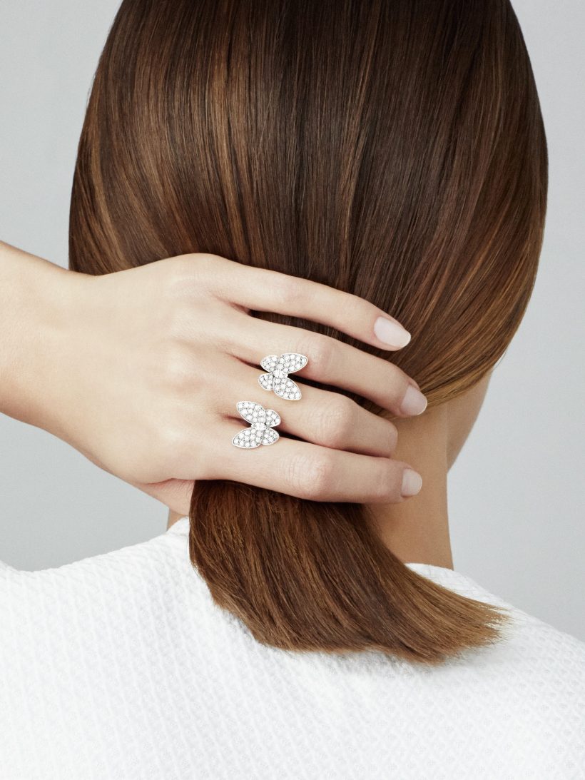 Two Butterfly Between the Finger Ring