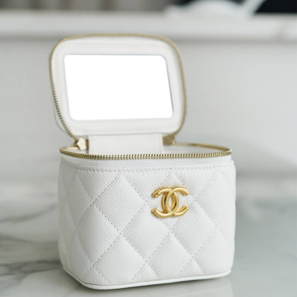 Chanel Small Gold Ball Makeup Bag