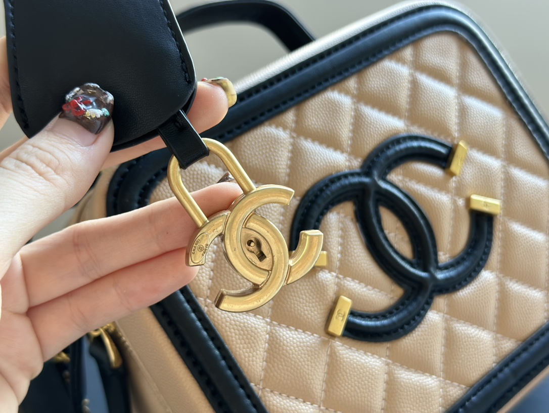 CHANEL Grained Calfskin CC Filigree Vanity Clutch With Chain