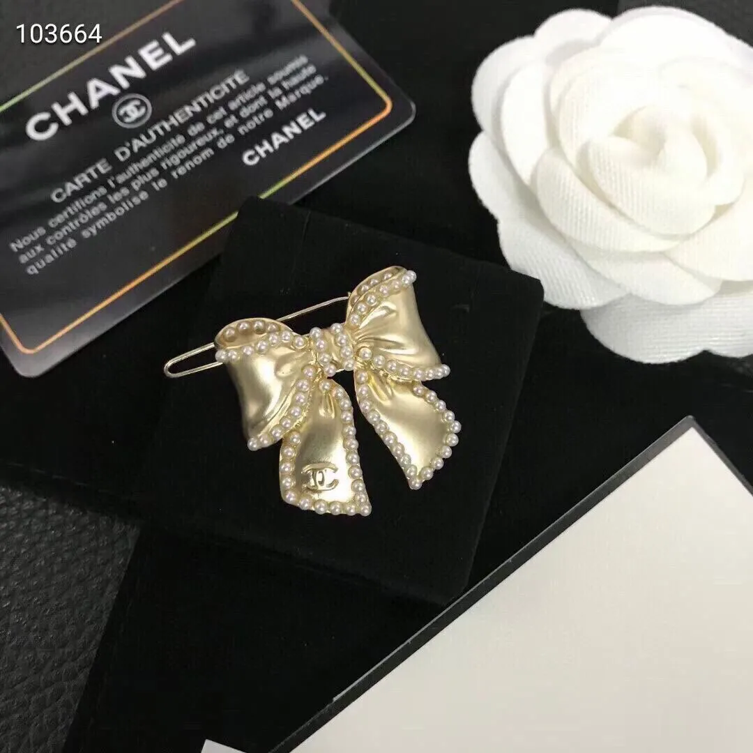 cc Brooch