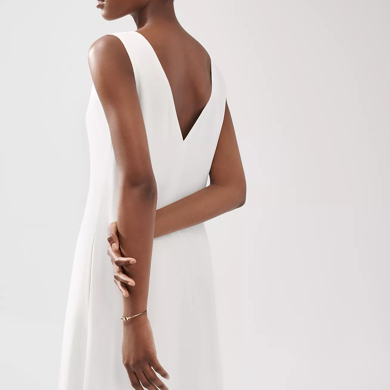 Tiffany & Co. T Narrow Wire Bracelet in Stainless steel and gold plating Gold