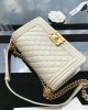 CHANEL CAVIAR QUILTED MEDIUM BOY FLAP IVORY