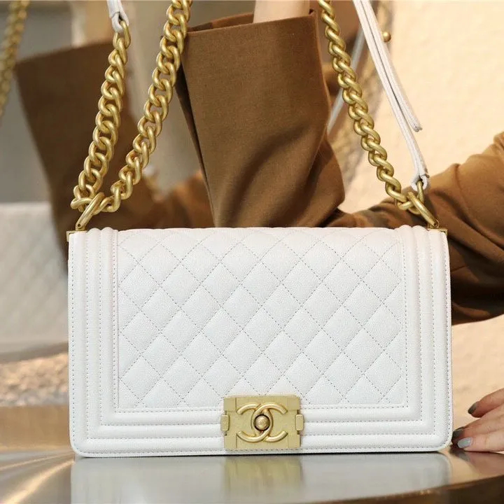 CHANEL CAVIAR QUILTED MEDIUM BOY FLAP IVORY