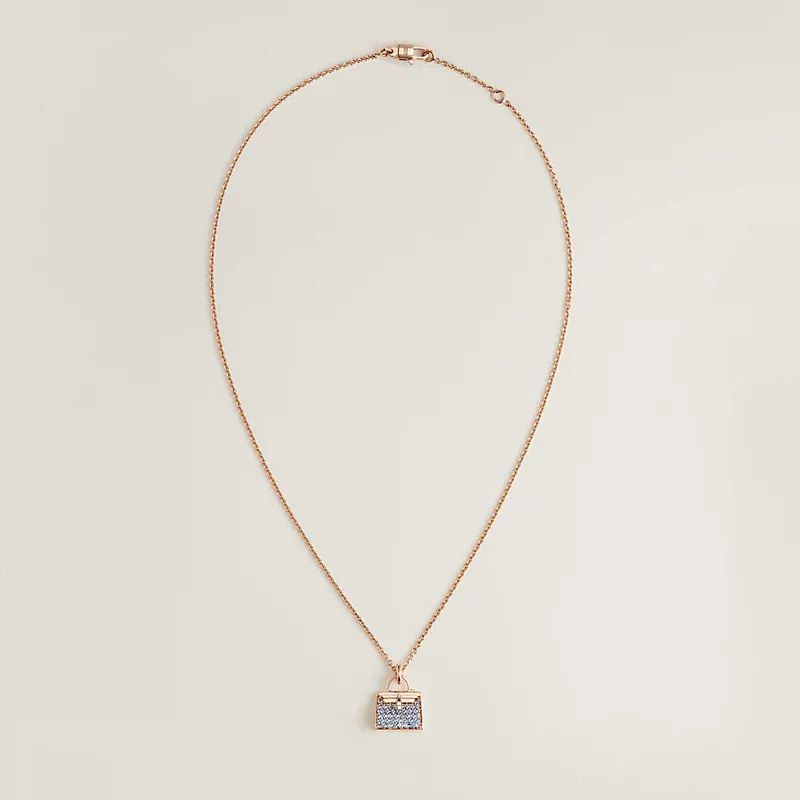 Hermes Amulettes Kelly pendant