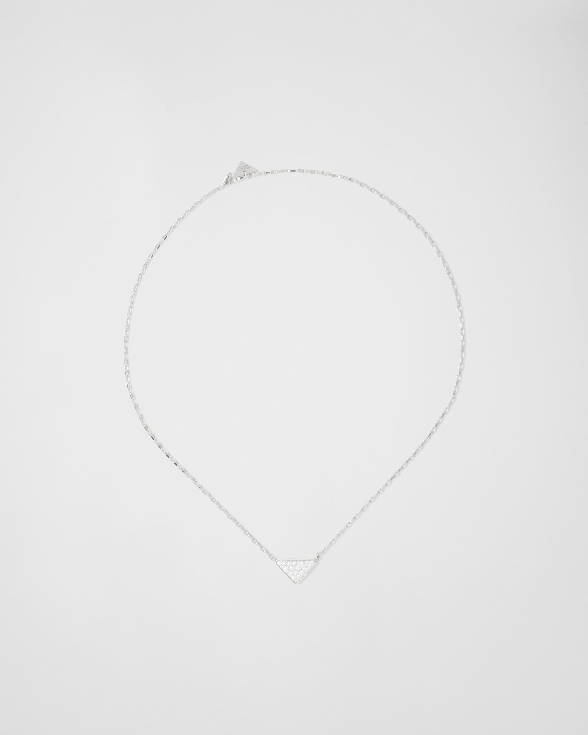 Prada Eternal Gold mini triangle pendant necklace in white gold and diamonds