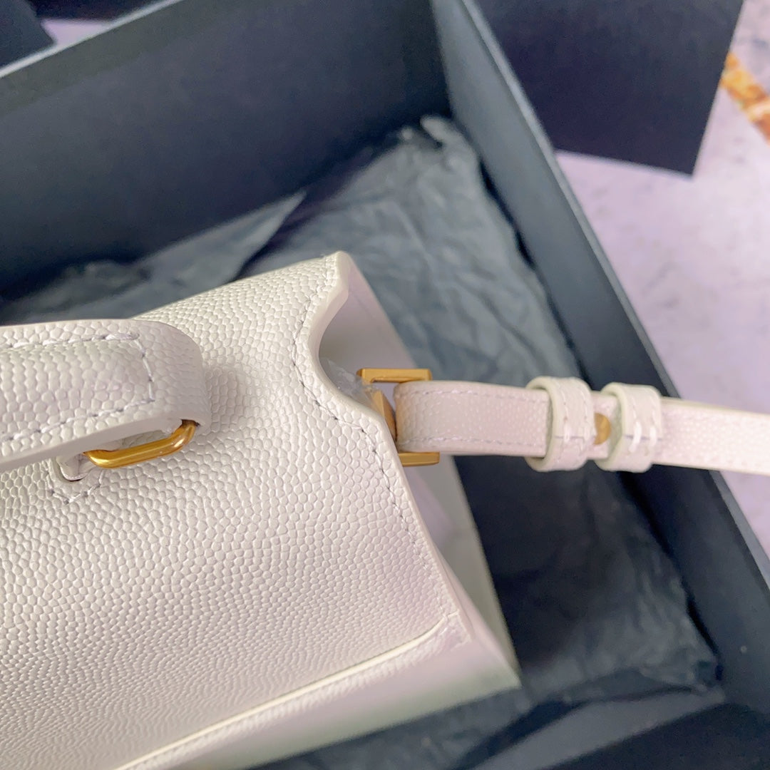 YSL Cassandra Medium Top Handle Bag in Grain Poudre Embossed Leather