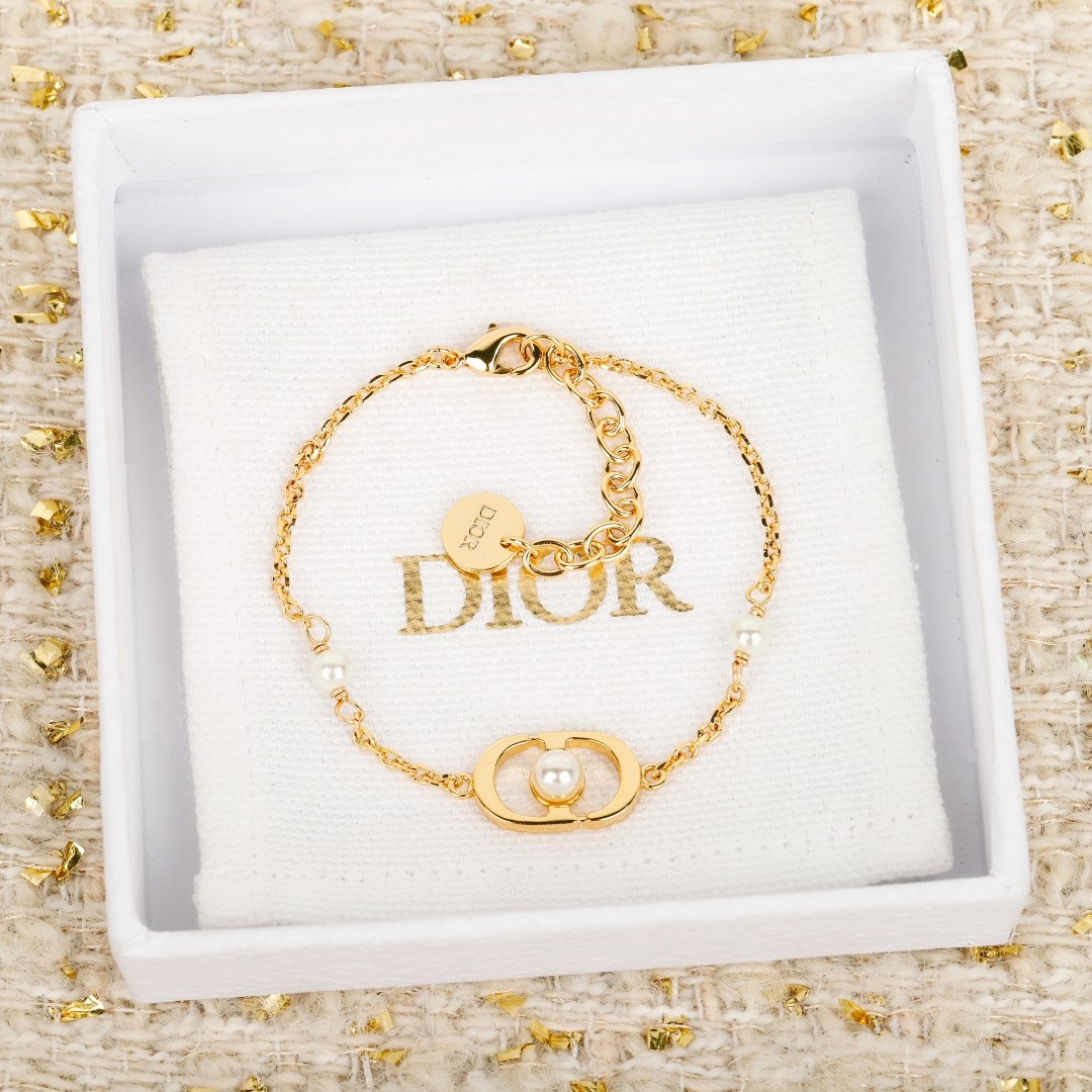 Dior Gold-finish Metal with CD Signature Centered with Resin Pearl Bracelet - KAIROO