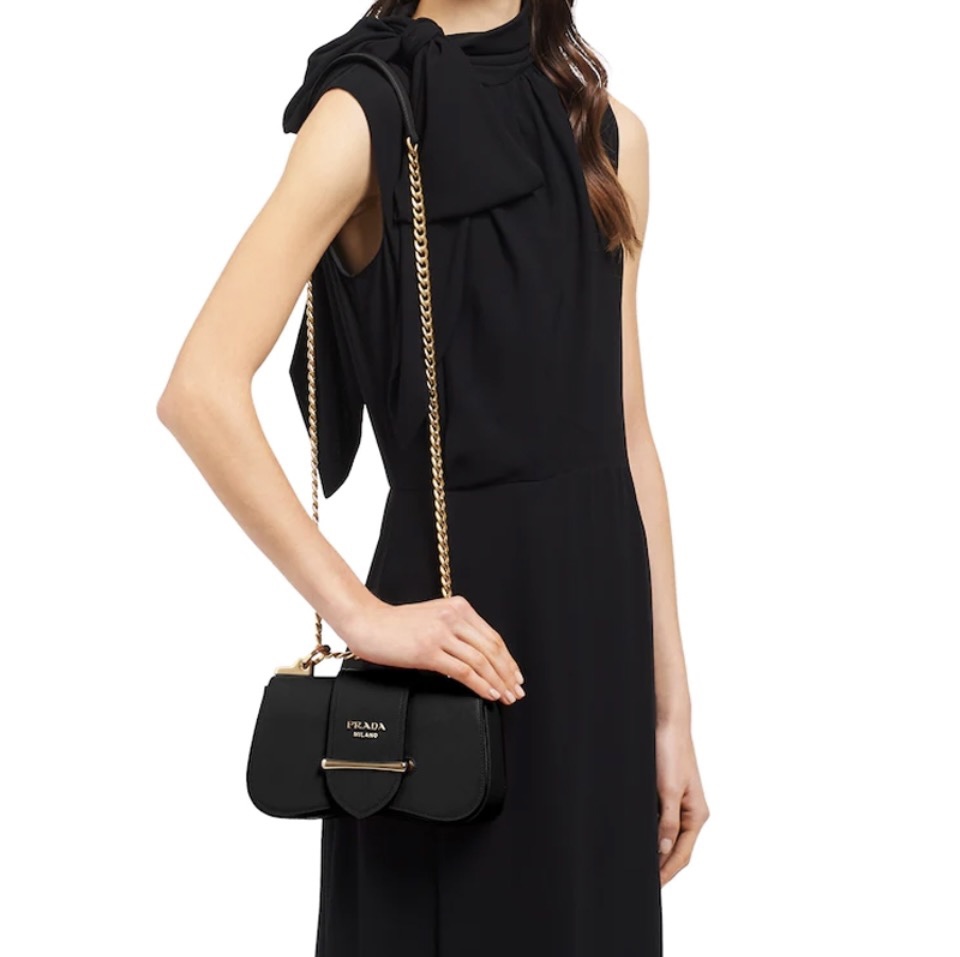 Prada Sidonie Leather Flap Metal Bar Closure Curved Shoulder Bag - KAIROO