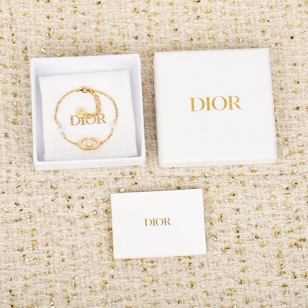 Dior Gold-finish Metal with CD Signature Centered with Resin Pearl Bracelet - KAIROO